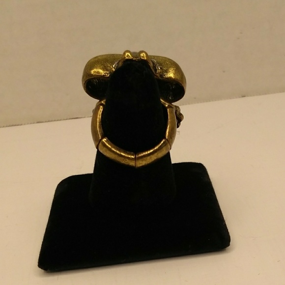 Stretch to fit ring. Bronze colored. - Picture 2 of 2